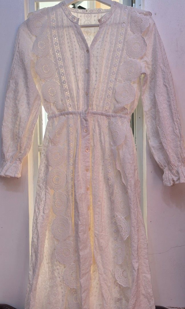 Vintage style white eyelet dress (Category: Dresses) located in Tuguegarao City. Submitted by zenphoenix-7ad615 (Listing ID 1468968709, Image 1). Description: Pretty eyelet dress long sleeve Fits small to medium frame Shoulder to shoulder 16 inches Length 43 inches.