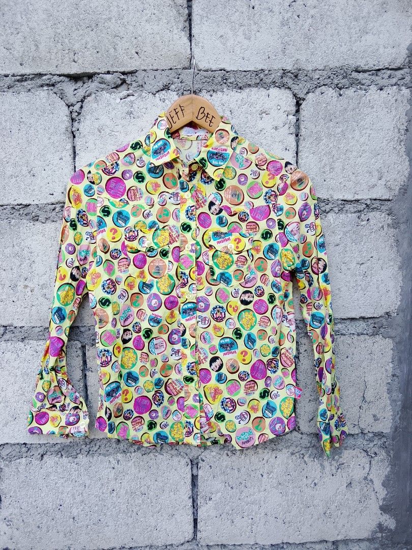 Vintage y2k ANGEL BLUE printed button down (Category: Longsleeves) located in Bayombong. Submitted by jeffreybee (Listing ID 1469098729, Image 1). Description: presentable no issues 22 length 17.5 width.