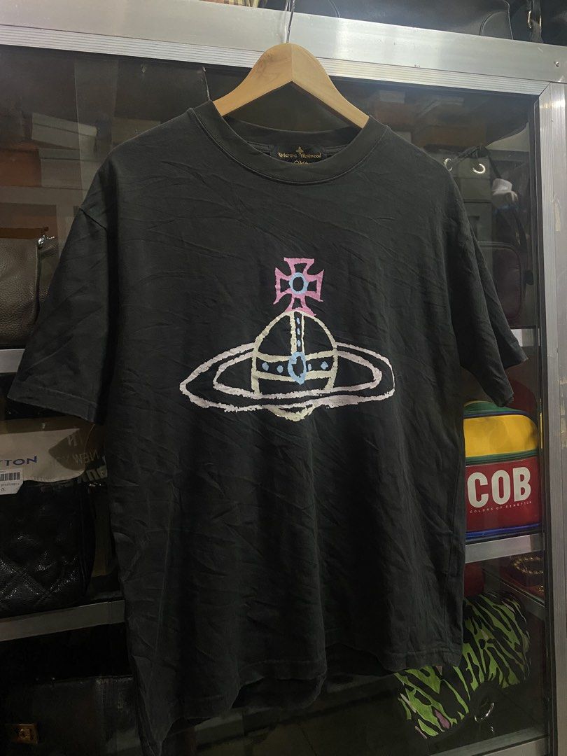 Viviene Westwood (Category: Luxury Apparel) located in Kalibo. Submitted by rvna23 (Listing ID 1468999866, Image 1). Description: Viviene Westwood big logo shirt 21 X 27.