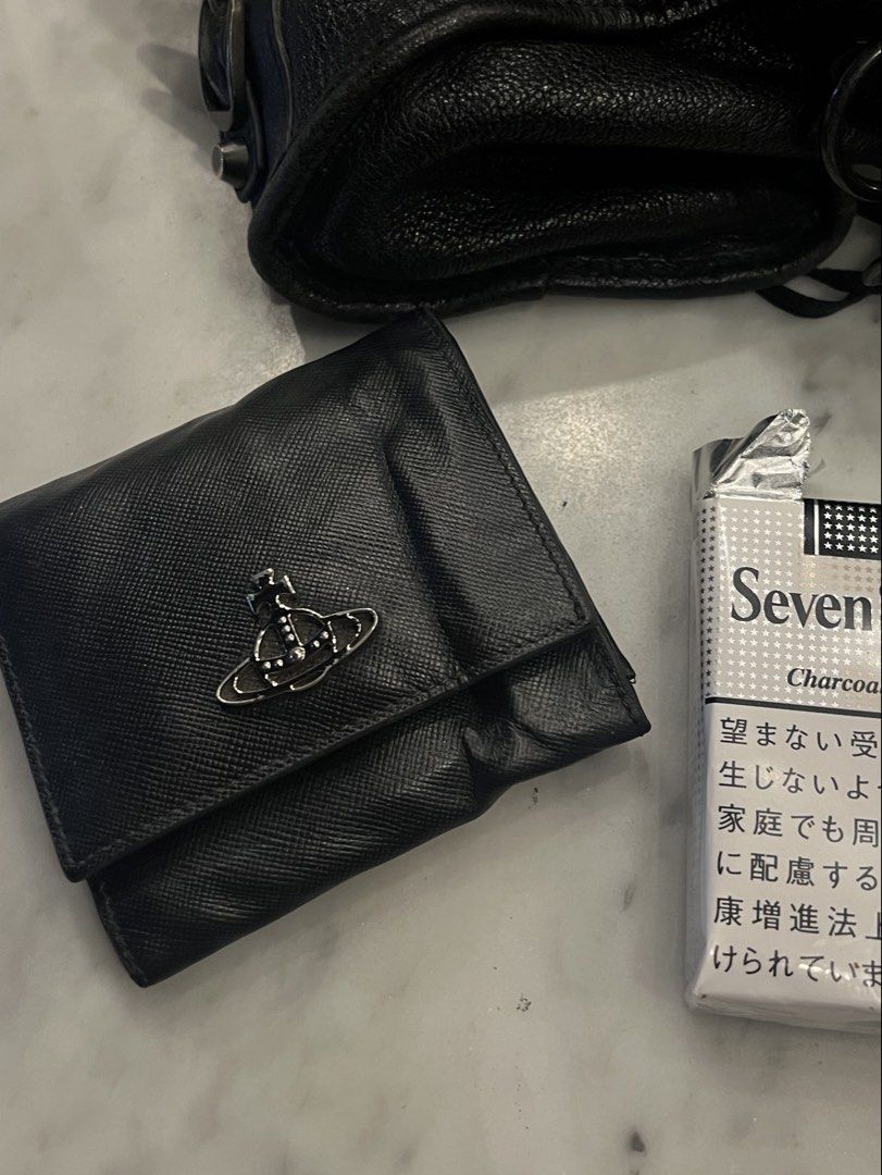 vivienne westwood wallet (Category: Luxury Bags & Wallets) located in San Fernando. Submitted by nala555 (Listing ID 1469056842, Image 1). Description: please read ! good condition besides the creases, easy to fix! i think it's genuine naman as a vw collector Rfs: actually just bought this today but i found a better option! price is nego for sure buyer. will keep if no one buys sf, pampanga loc j&t .