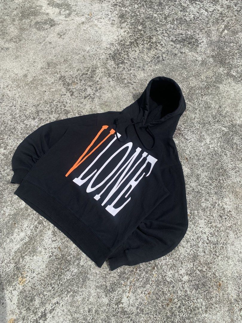 Vlone Hoodie (Category: Coats, Jackets and Outerwear) located in Baguio. Submitted by reniel_thrift (Listing ID 1469056867, Image 2). Description: forsale Vlone Friends Hoodie in Black/Orange •Excellent Condition •Color Rate: 9.5/10 •Issue: None -Size Large On tag -Width 22 -Length 27 ₱880ship 📍Baguio City🌲.