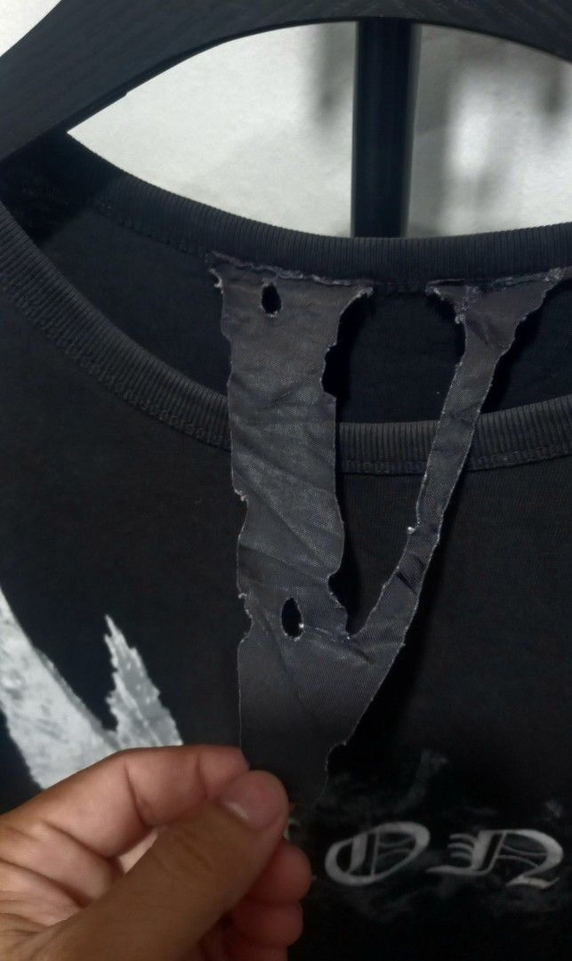 Vlone Lone Black T-Shirt (Category: Tshirts & Polo Shirts ) located in Tarlac. Submitted by den420 (Listing ID 1469108449, Image 3). Description: - Brand: Vlone - Color: Black - Design: "Lone" winged skeleton graphic on front, large V signature logo on back - Fit: Regular fit, short sleeve, classic crew neck - Material: 100% comfortable cotton - Authenticity: Includes signature Vlone interior neck tag - Condition: Brand new / Excellent quality st