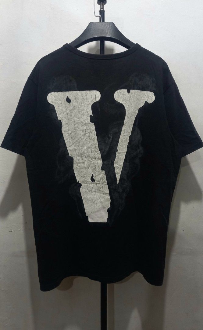 Vlone Lone Black T-Shirt (Category: Tshirts & Polo Shirts ) located in Tarlac. Submitted by den420 (Listing ID 1469108449, Image 2). Description: - Brand: Vlone - Color: Black - Design: "Lone" winged skeleton graphic on front, large V signature logo on back - Fit: Regular fit, short sleeve, classic crew neck - Material: 100% comfortable cotton - Authenticity: Includes signature Vlone interior neck tag - Condition: Brand new / Excellent quality st