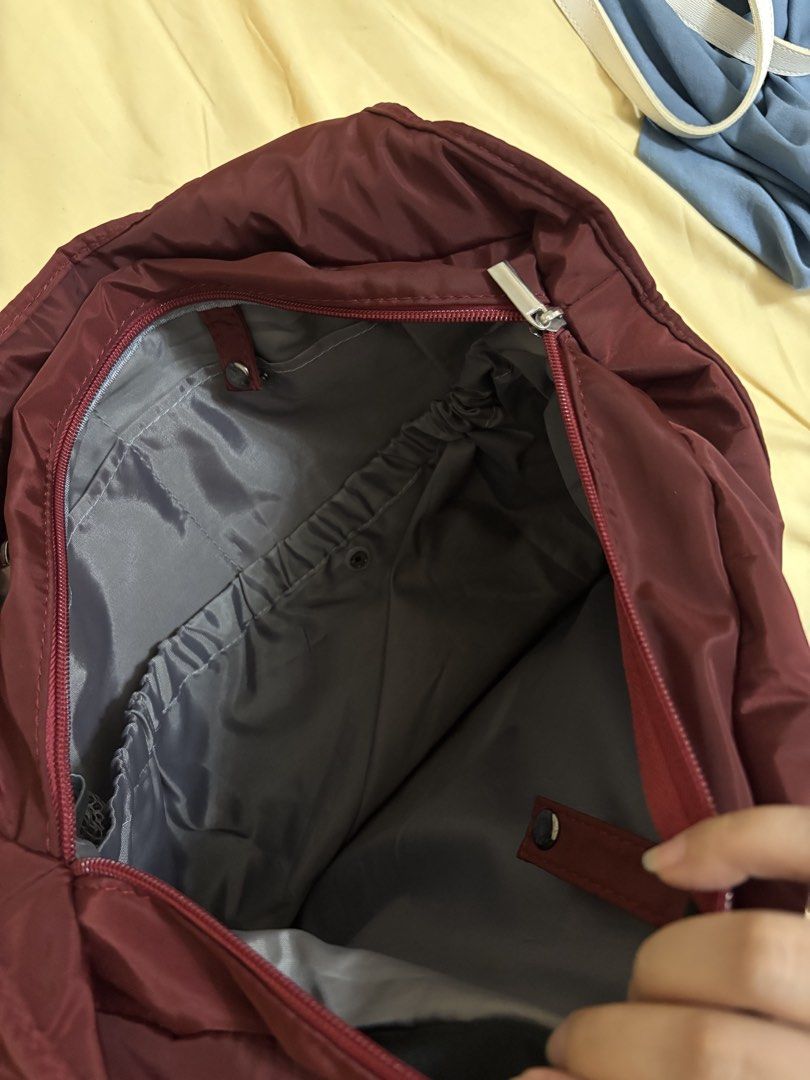 Wanderskye Everyday Tote Bag | Nylon Fabric | Waterproof | Maroon (Category: Tote Bags) located in Manila. Submitted by prelovedbymrsd (Listing ID 1469017175, Image 3). Description: Wanderskye Everyday Tote Bag | Maroon Selling my Wanderskye Everyday Tote in good-as-new condition! Original price: ₱1,709 Selling price: ₱800 only! Features: * Comfortable and portable * Waterproof nylon fabric * Front pocket + extra compartments * Hardware button cl