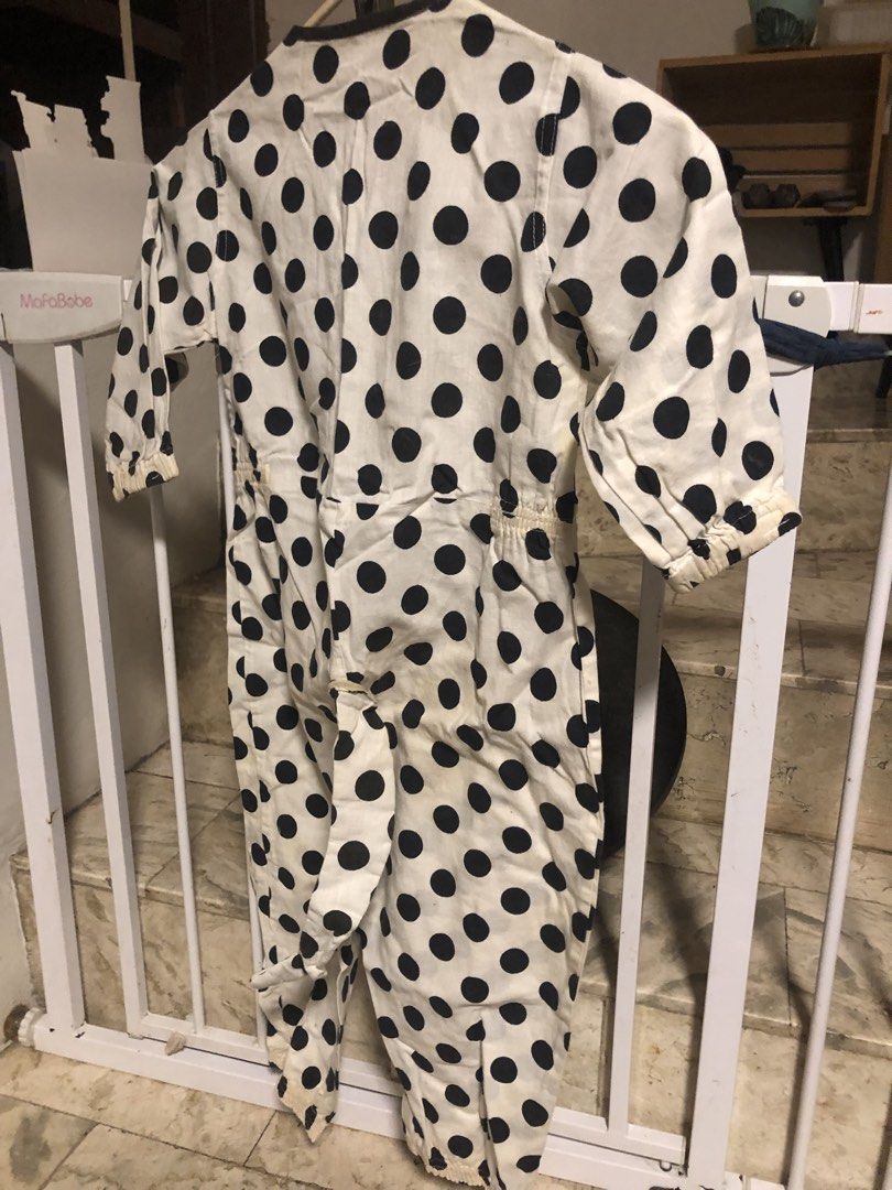 White and Black Polka Dot Jumpsuit (Category: Babies & Kids Fashion) located in Paranaque City. Submitted by adellistuff (Listing ID 1469029167, Image 1). Description: - Style: Cow costume with tail - Fit: Elastic waistline and elastic cuffs on long sleeves and legs - Closure: Convenient button-down front - Fabric: Lightweight and comfortable - Condition: Needs washing.