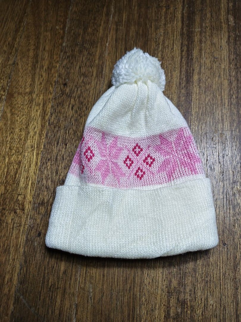 White and Pink Patterned Winter Beanie with Pom Pom (Category: Hats & Beanies) located in Mandaluyong City. Submitted by heatgear (Listing ID 1469049145, Image 1). Description: - Color: White with pink and red patterned band - Design: Foldover cuff with a fluffy pom pom on top - Material: Soft knit inside and out - Feature: Keeps your head extra warm during cold weather trips - small to large women's 280 + sf location mandaluyong.