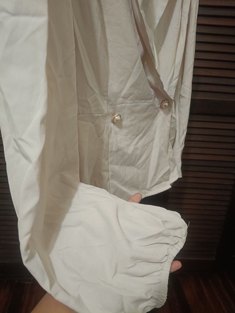 White Blazer-Style Blouse with Gold Buttons (Category: Blouses) located in Manila. Submitted by byjrb (Listing ID 1469050383, Image 2). Description: 🛍️ Brand-new items from SHEIN, Emery Rose, Zaful, No brand & more! Size : Large 📦 Shipping: LBC / J&T / Lalamove 💸 MOP: GCash / BPI only Note : Brand is listed as SHEIN for listing purposes. All items are sourced from shein-bales. Shipping schedule. Wednesday and Saturday : shipping day..