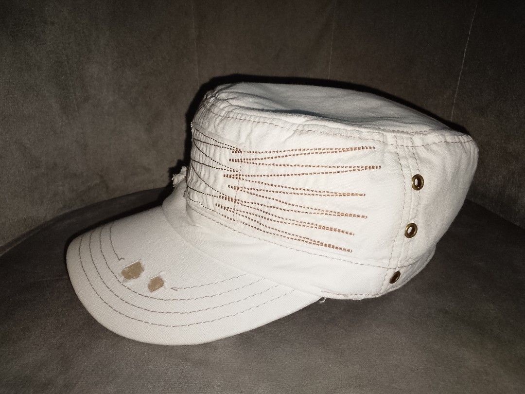 White Distressed Military Cadet Cap with Decorative Stitching (Category: Caps & Hats) located in Binangonan. Submitted by yuristalin888 (Listing ID 1469145550, Image 2). Description: Stylish white military-inspired cadet cap featuring distressed tan fabric accents, contrast stitching, metal eyelets, and a curved brim. Designed with a unique vintage, rugged look, this one-size cap is a fashionable accessory for casual outfits and streetwear styles