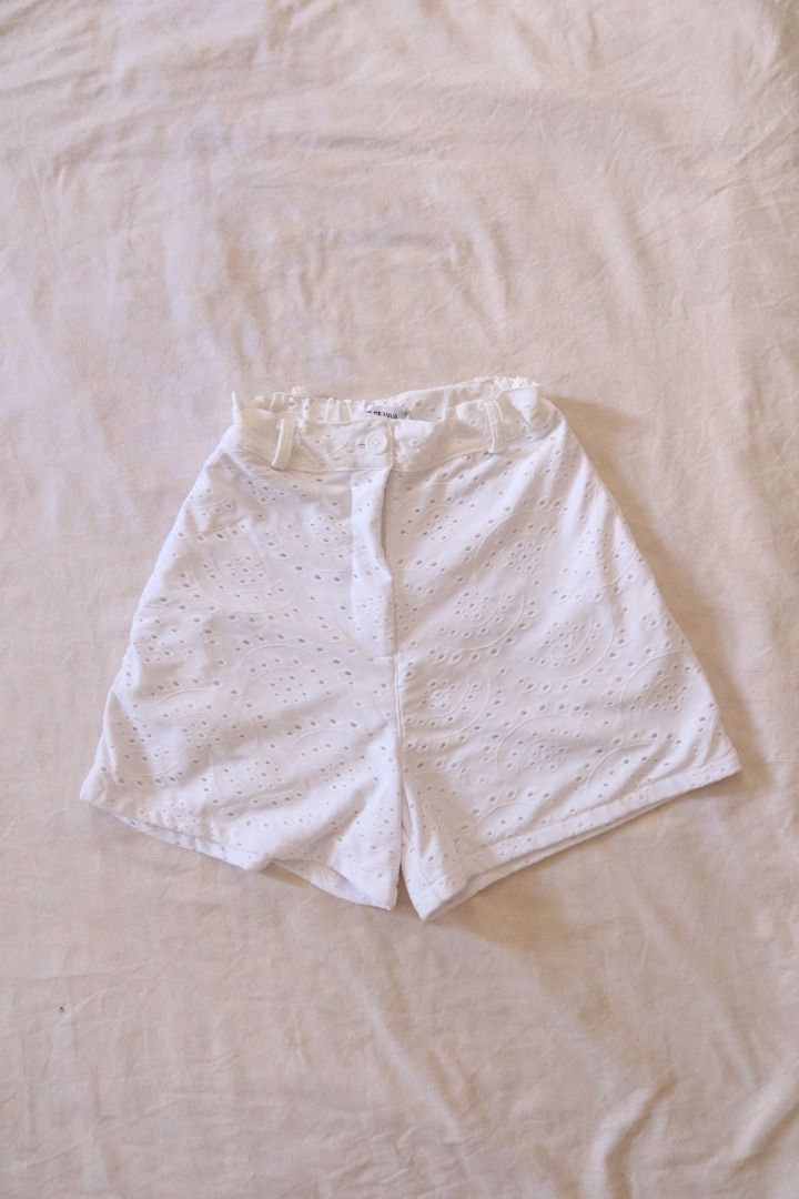 White eyelet lace high-waisted shorts (Category: Shorts) located in Manila. Submitted by imama23 (Listing ID 1468950267, Image 1). Description: White eyelet lace shorts with elastic waistband - Top is also for sale, interested buyers may check my profile for the listing :D Condition: 9/10 Measurement: - Waist: 11in (stretchable up to 14in) - Length: 15-16in Location: Manila (near taft) 📦 SHIPPING • Full payment before shipping • NCR: J&T (1–3 da