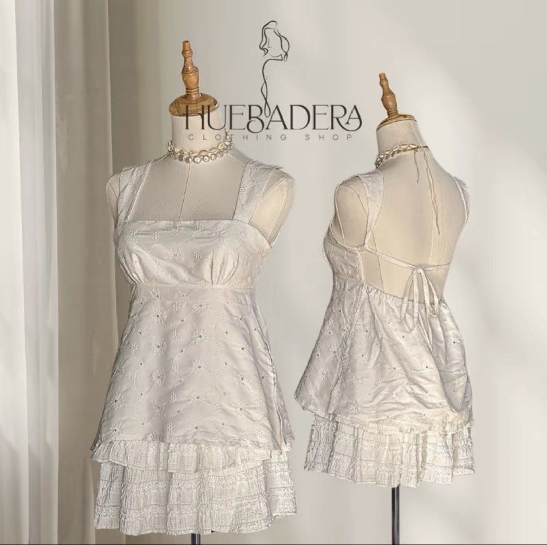 White Eyelet Open Back Tie Top (Category: Sleeveless) located in Quezon City. Submitted by ynnapenyaranda (Listing ID 1468867312, Image 3). Description: - Style: White eyelet top with all-over floral embroidery - Design: Square neckline, wide straps, and open back with tie closure - Details: Gathered hem with bottom tie strings - Fabric: Lightweight and breathable, ideal for warm weather.