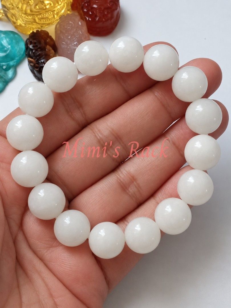 White Hetian Jade 12mm (Category: Bracelets) located in Taguig. Submitted by mimisrack (Listing ID 1469160548, Image 2). Description: 🤍🍀 Good Luck & Fortune — traditionally cherished as a symbol of blessings and favorable opportunities.💰 Wealth & Prosperity — associated with abundance, success, and financial well-being. 🧘 Peace & Serenity — symbolizes tranquility, patience, and inner harmony. 🛡️ Protection & Safety — traditionally worn as a 