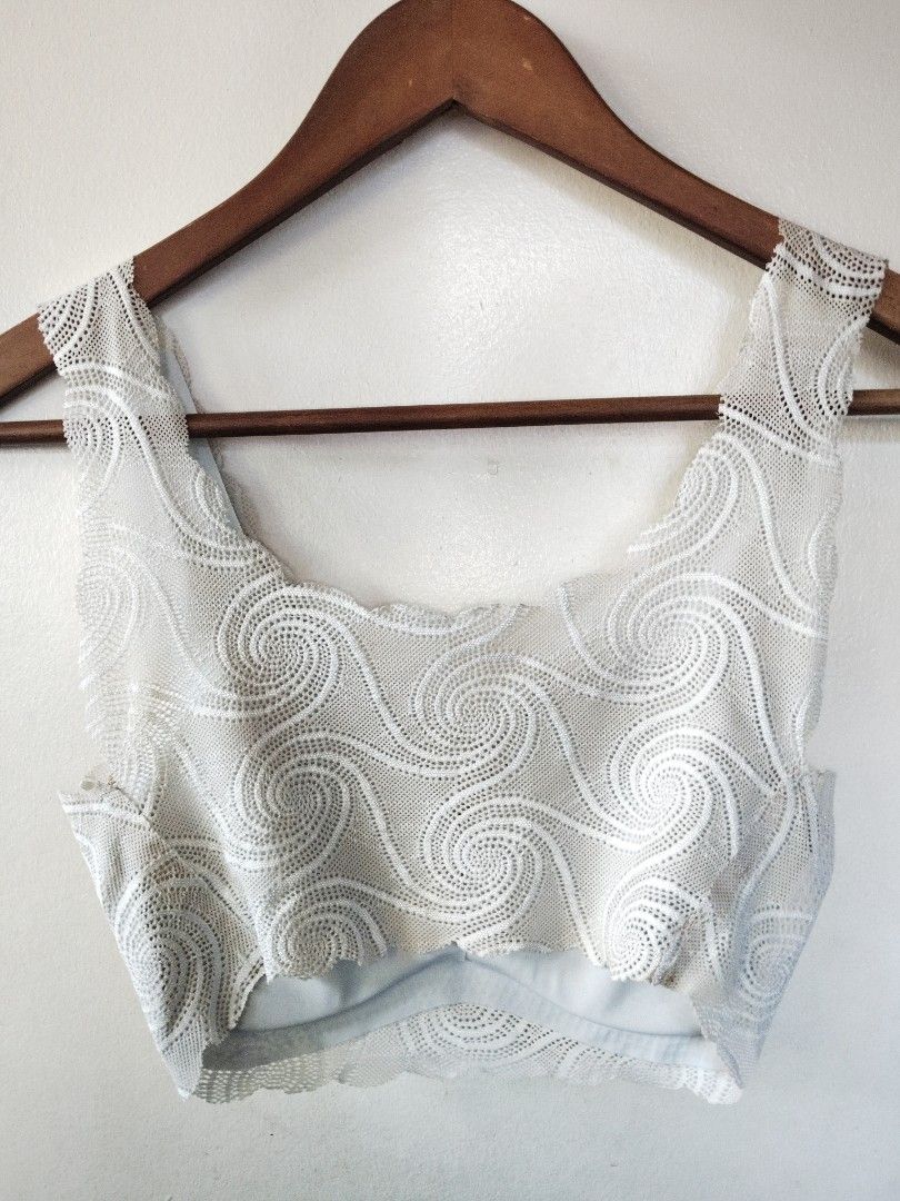 White Lace Bralette Crop Top Swirl Pattern (Category: Undergarments & Loungewear) located in San Juan City. Submitted by rhennx (Listing ID 1469051889, Image 2). Description: - Color: Glacial Green ‼️Need wash (not in very good color condition) - Design: All-over swirl pattern with delicate scalloped edges - Support: Wireless padded design with a secure underband - Comfort: Soft, stretchable, lightweight, and breathable material - Style: Scoop ne