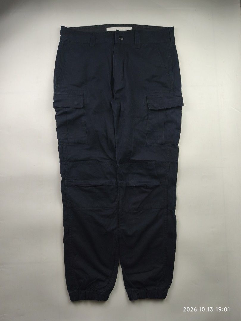 White mountaineering cargo pants (Category: Joggers) located in Manila. Submitted by corner_finds (Listing ID 1469030519, Image 1). Description: size 1 on tag waistline 32' inseam 27.5' leg opening 5.2' front rise 11' thigh 11' elasticated opening leg color navy no major flaws still in great condition 1799+sf dm.