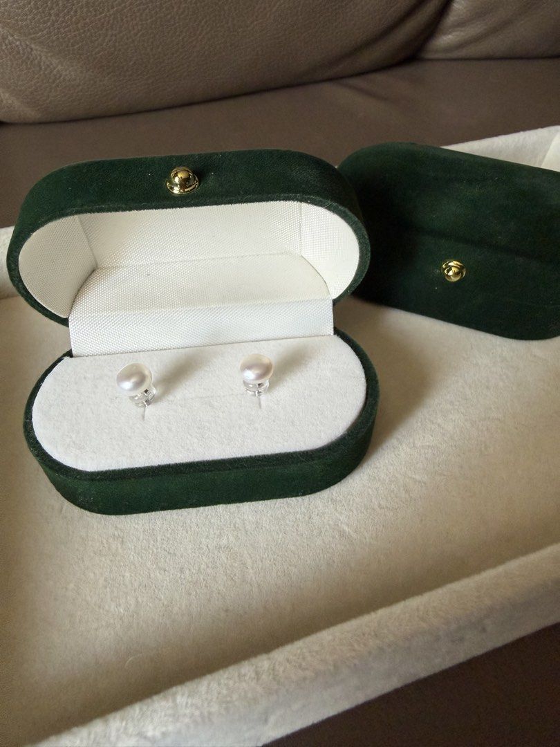 White Pearl Stud Earrings (Category: Earrings) located in Quezon City. Submitted by madz_jacq (Listing ID 1468947172, Image 1). Description: - Freshwater white pearl stud earrings - Hallmarked S925 sterling silver posts - Includes japan silicone stoppers for a secure fit - Packed in an elegant dark green velvet storage box with gold-tone hardware - Minimalist design, perfect for everyday wear or dressing up RFS: unused/extra pairs.