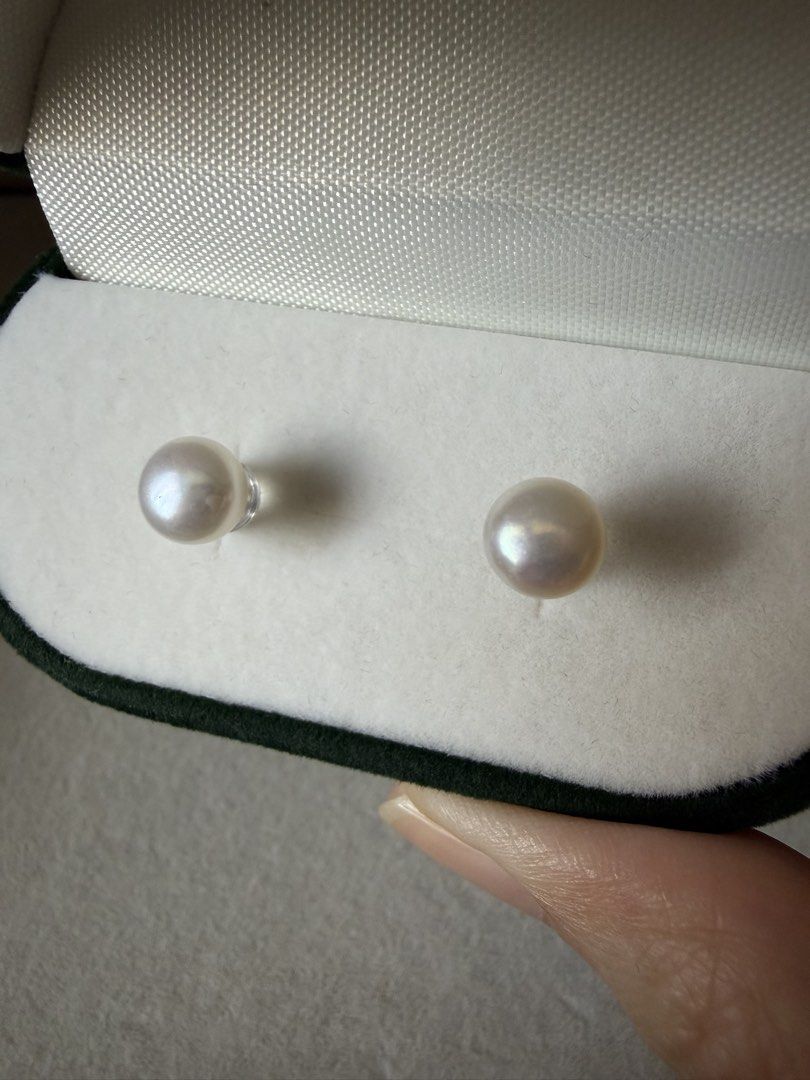 White Pearl Stud Earrings (Category: Earrings) located in Quezon City. Submitted by madz_jacq (Listing ID 1468947172, Image 2). Description: - Freshwater white pearl stud earrings - Hallmarked S925 sterling silver posts - Includes japan silicone stoppers for a secure fit - Packed in an elegant dark green velvet storage box with gold-tone hardware - Minimalist design, perfect for everyday wear or dressing up RFS: unused/extra pairs.