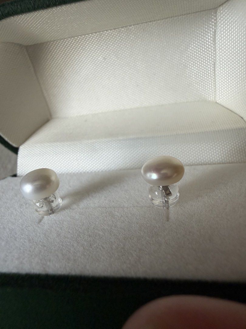 White Pearl Stud Earrings (Category: Earrings) located in Quezon City. Submitted by madz_jacq (Listing ID 1468947172, Image 3). Description: - Freshwater white pearl stud earrings - Hallmarked S925 sterling silver posts - Includes japan silicone stoppers for a secure fit - Packed in an elegant dark green velvet storage box with gold-tone hardware - Minimalist design, perfect for everyday wear or dressing up RFS: unused/extra pairs.