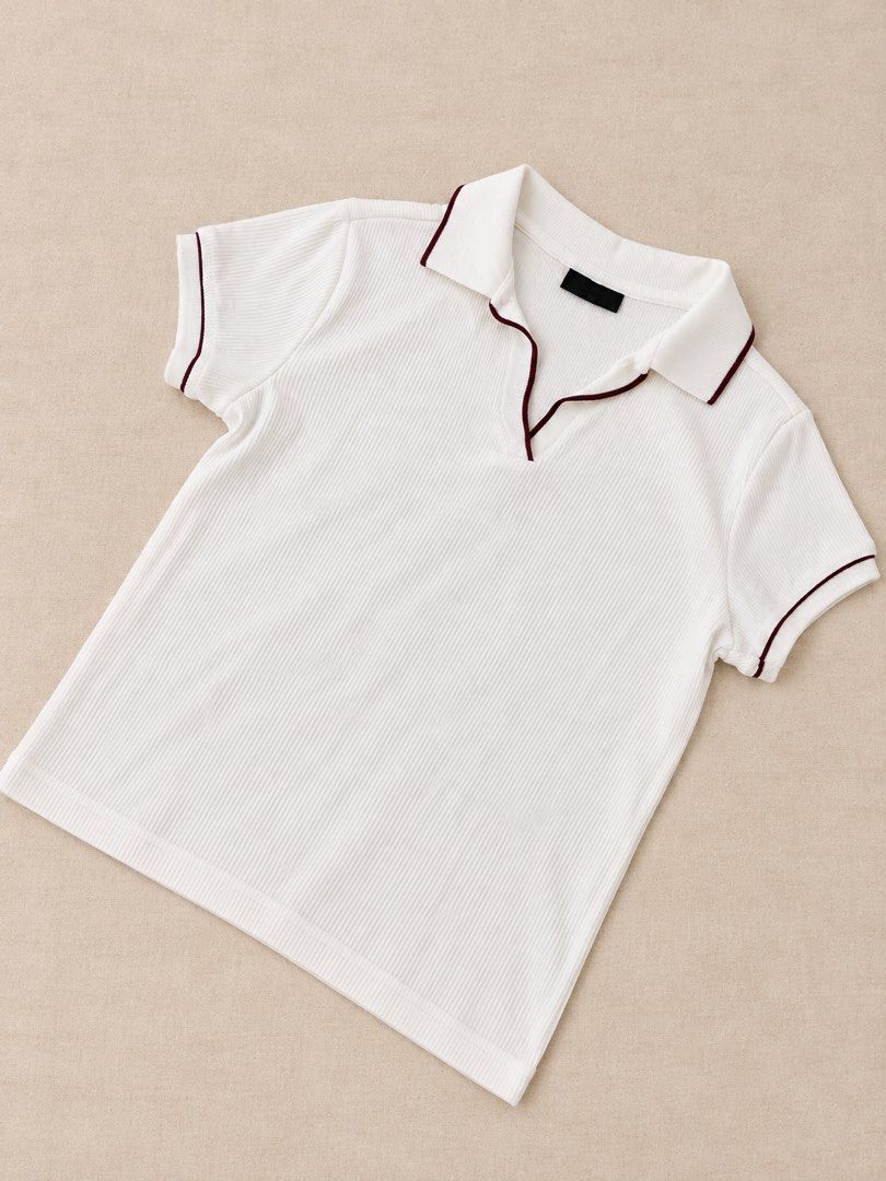 White Polo Shirt (Category: Blouses) located in Manila. Submitted by lexiandco.ph (Listing ID 1469055988, Image 1). Description: .