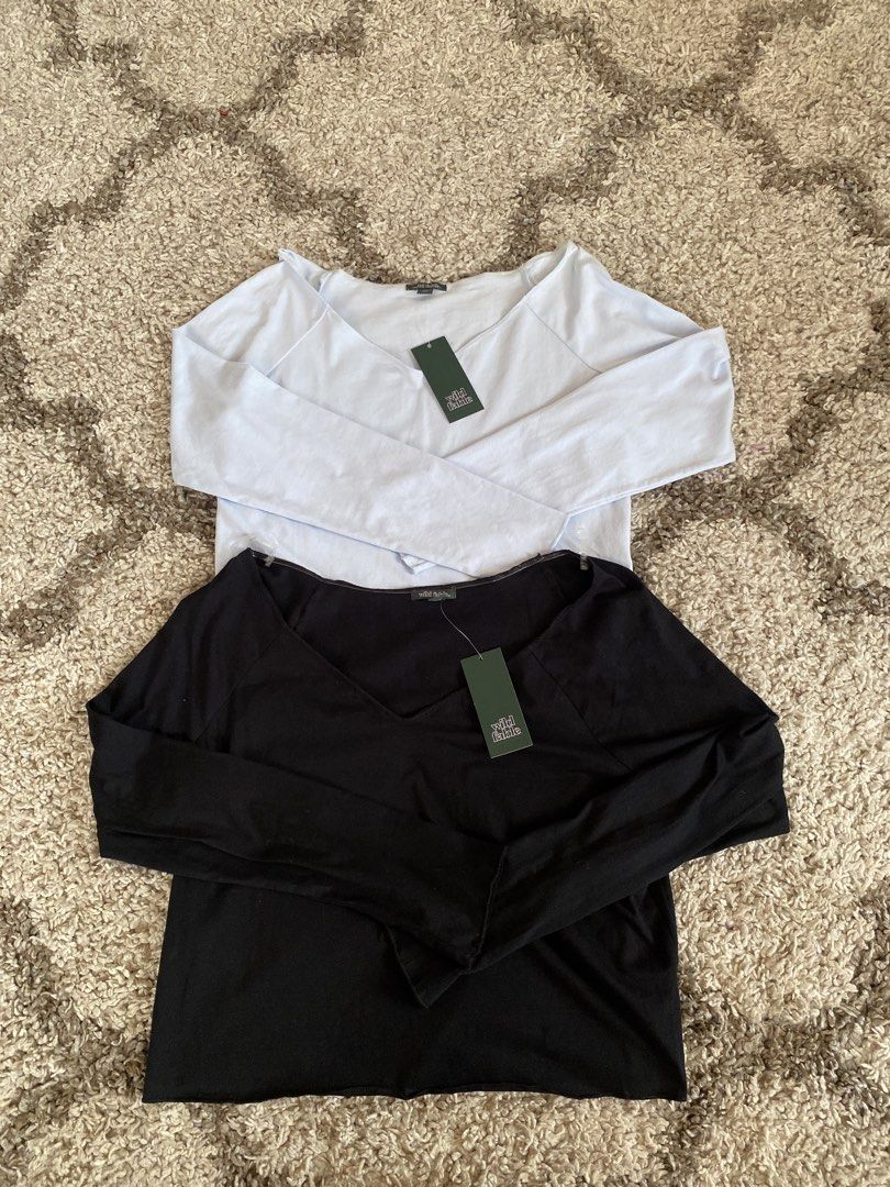 Wild Fable Long Sleeve Off Shoulder Tops (Category: Longsleeves) located in Batangas. Submitted by lux_kimmy (Listing ID 1468979877, Image 2). Description: - Brand: Wild Fable (Target) - Quantity: Bundle of 2 tops - Colors & Sizes: Light Blue (Size L) and Black (Size XXL) - Features: V-neckline, trendy raw hem details, and super soft, comfortable fabric - Condition: Brand new with original tags attached ₱250 each only.