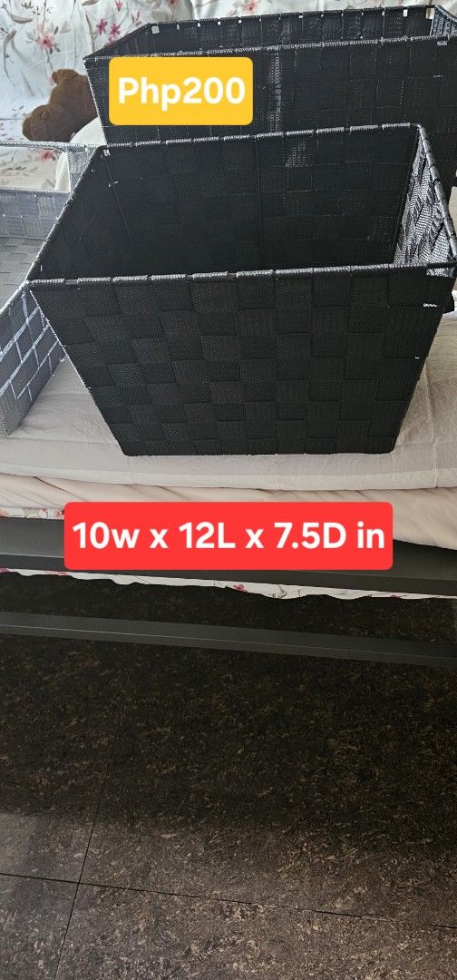 Woven Storage Baskets Various Sizes Colors (Category: Storage Boxes & Baskets) located in Quezon City. Submitted by safeforest.492237 (Listing ID 1469107002, Image 2). Description: - Product: Versatile woven storage baskets with built-in side handles - Colors available: Gray and black - Ideal uses: Perfect for organizing shelves, closets, and desktops - Size range: From 6W x 10L x 4.5D inches up to 13W x 15L x 10D inches - Price: Php100 to Php400