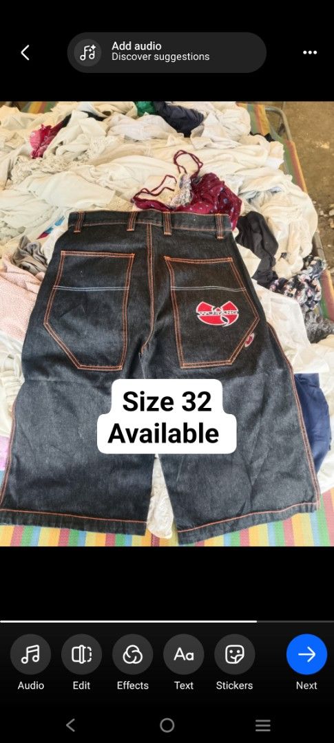 Wu-Tang Denim Shorts Size 32 (Category: Shorts) located in Carcar. Submitted by rolandobac92675 (Listing ID 1468974070, Image 1). Description: - Brand: Wu-Tang - Item: Denim Shorts - Wash: Dark Wash - Size: 32 - Fit: Relaxed, wide leg style - Details: Large embroidered Wu-Tang logo on back pocket, contrast orange stitching - Condition: Great, clean overall with graphics fully intact - Style: Perfect for streetwear and hip-hop enthusiasts.