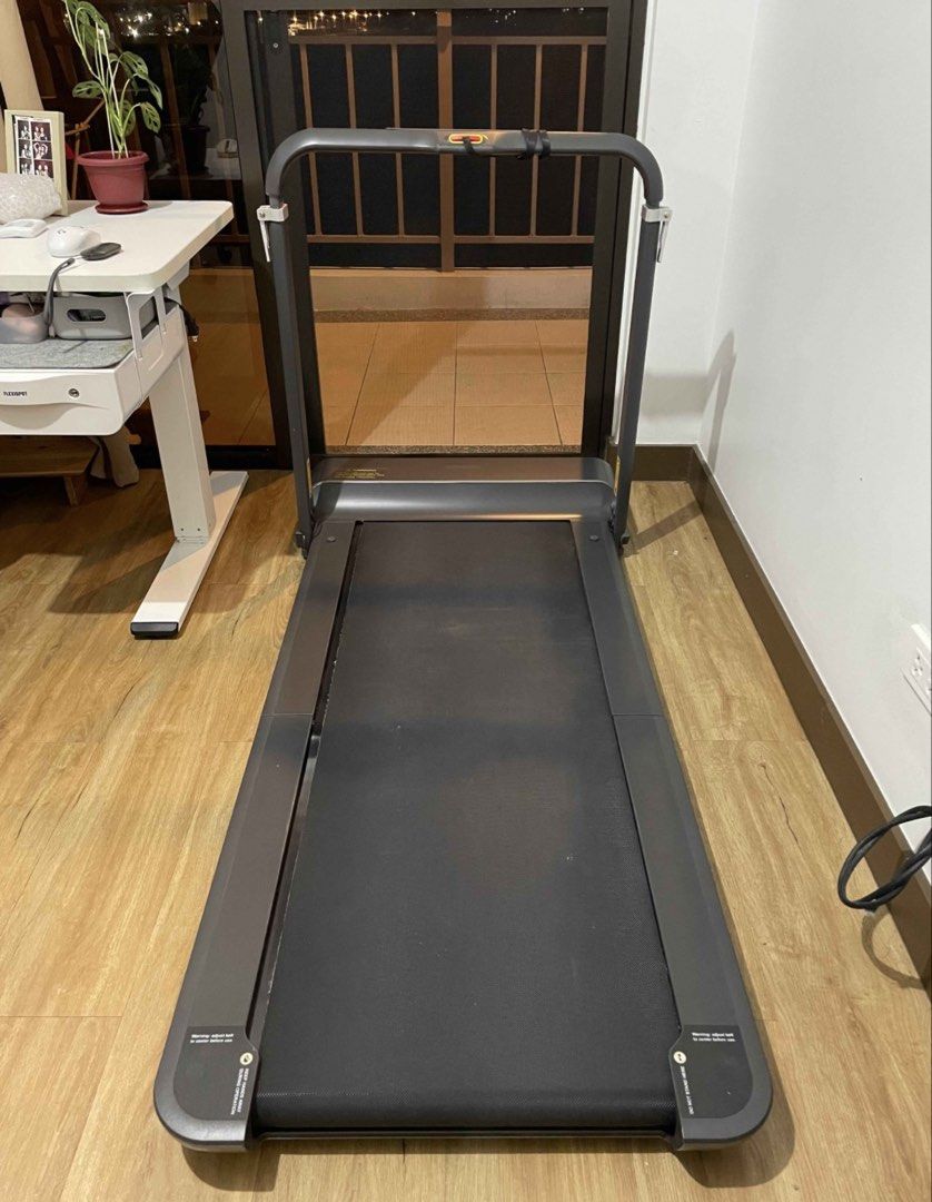 Xiaomi Kingsmith R1 Pro Walking Pad Foldable Treadmill (Category: Cardio & Fitness Machines) located in Quezon City. Submitted by ekacloset (Listing ID 1469095515, Image 2). Description: Max speed: 10kph Max weight cap: 110 kg No issues. Just a few small scratches, normal signs of usage. Rfs: Decluttering - Color: Dark grey - Space-saving design that folds upright or flat for easy storage - Versatile for both home workouts and under-desk use - Fe