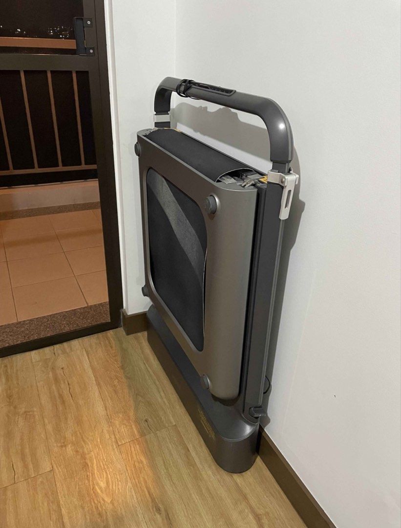Xiaomi Kingsmith R1 Pro Walking Pad Foldable Treadmill (Category: Cardio & Fitness Machines) located in Quezon City. Submitted by ekacloset (Listing ID 1469095515, Image 1). Description: Max speed: 10kph Max weight cap: 110 kg No issues. Just a few small scratches, normal signs of usage. Rfs: Decluttering - Color: Dark grey - Space-saving design that folds upright or flat for easy storage - Versatile for both home workouts and under-desk use - Fe