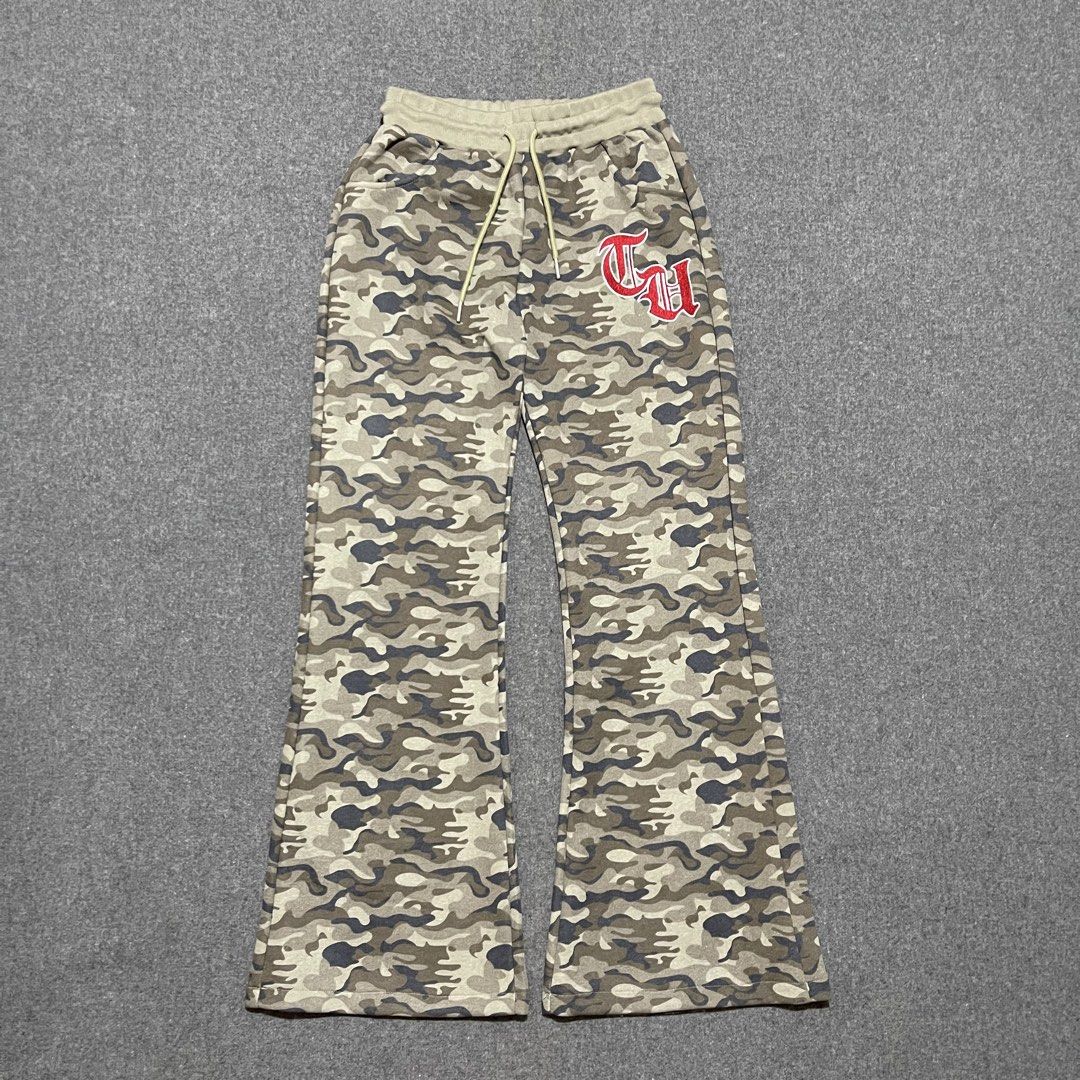 Y2K Camou Flared Pant (26-34) (Category: Other Bottoms) located in Pasig City. Submitted by _rosasass_ (Listing ID 1468966898, Image 1). Description: Heavy cotton good as new Waistline 26-35 Length 40 inch Hem 12 inch.