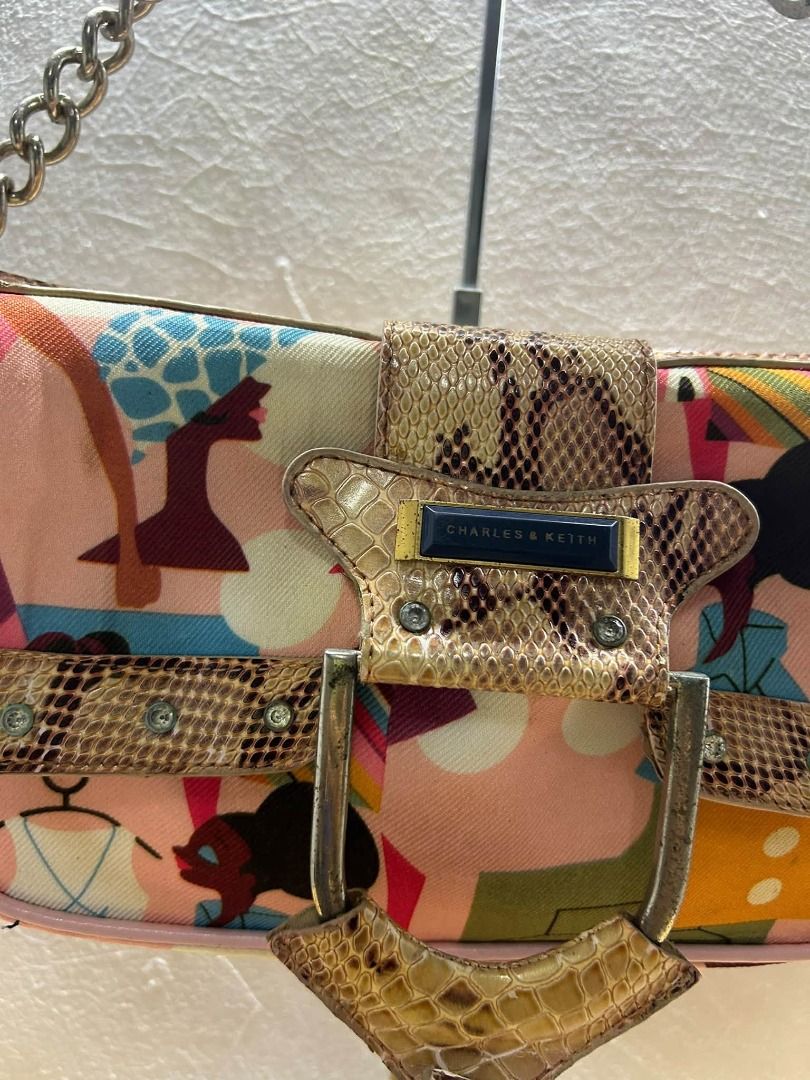 Y2K CHARLES @ KEITH MULTI COLOR KILI BAG (Category: Shoulder Bags) located in Caloocan City. Submitted by j3ngsanity (Listing ID 1469092716, Image 2). Description: ISSUE : SIGN OF USAGE / RUST SA HARDWARE / NEED CLEANING.