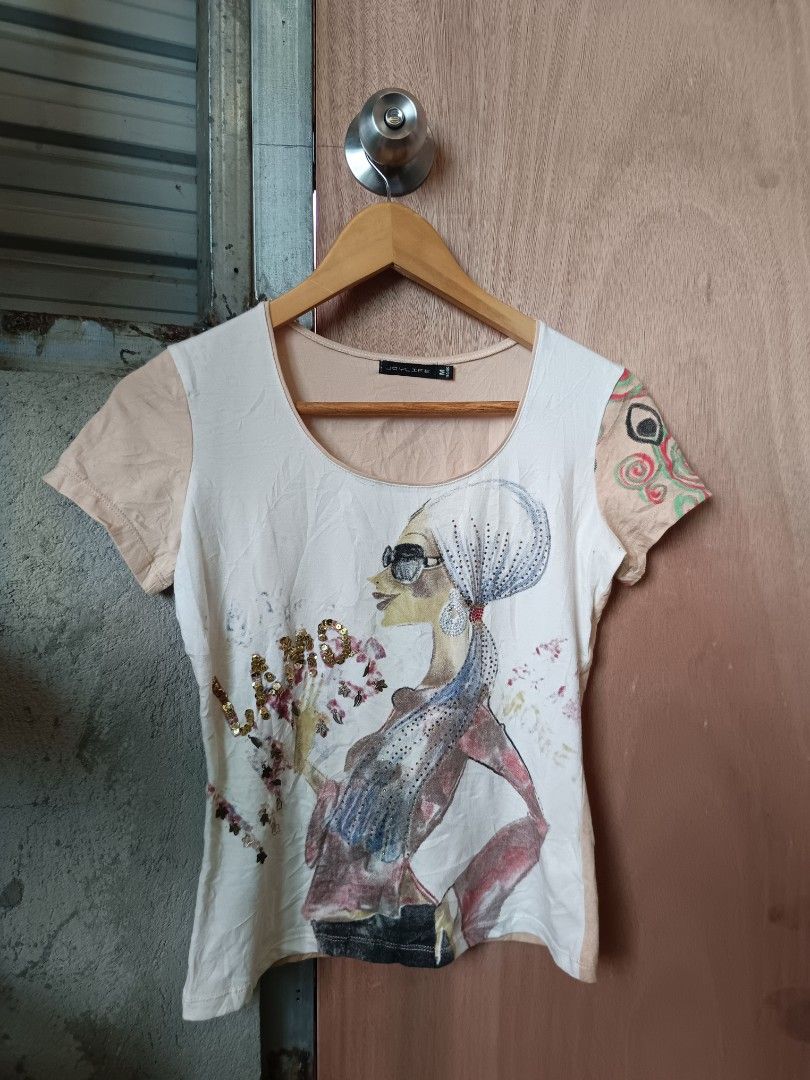 Y2k graphic top (Category: Shirts) located in Davao. Submitted by mln-boutique (Listing ID 1468969656, Image 1). Description: size - M minimal stain custo design.