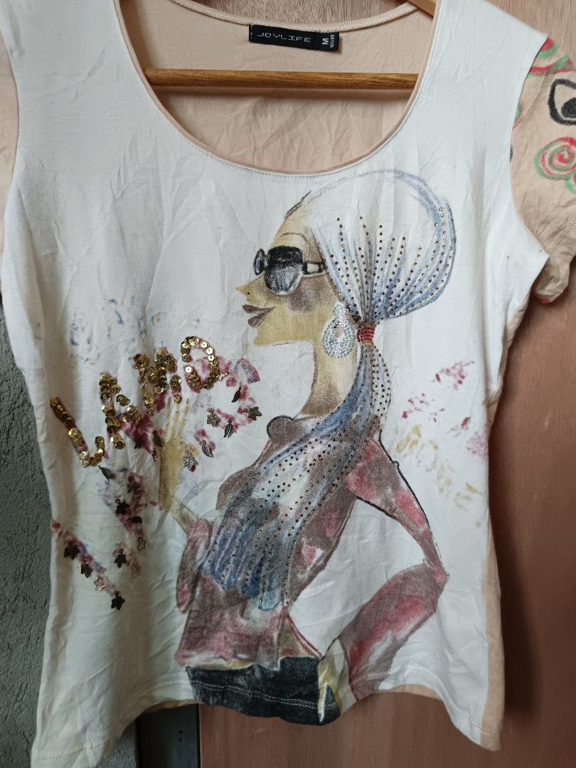 Y2k graphic top (Category: Shirts) located in Davao. Submitted by mln-boutique (Listing ID 1468969656, Image 2). Description: size - M minimal stain custo design.