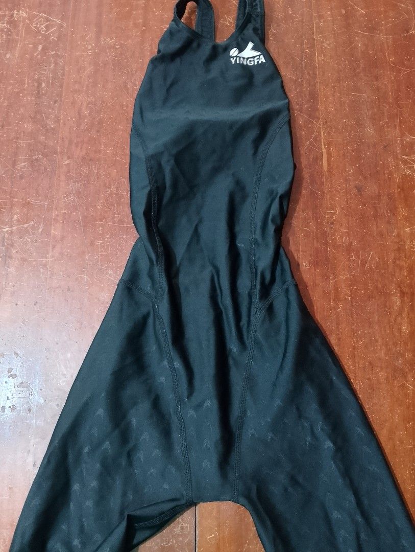 Yingfa Black Competitive Kneesuit Size M (155/80) (Category: Bikinis & Swimsuits) located in Dipolog. Submitted by violetsari2x (Listing ID 1468945194, Image 1). Description: - Brand: Yingfa - Style: Competitive kneeskin swimsuit with subtle black patterning - Size: M (155/80) - Material: 75% polyester, 25% elastane - Design: Open back with reinforced straps for ultimate support - Perfect for: Swim training and competitive racing.