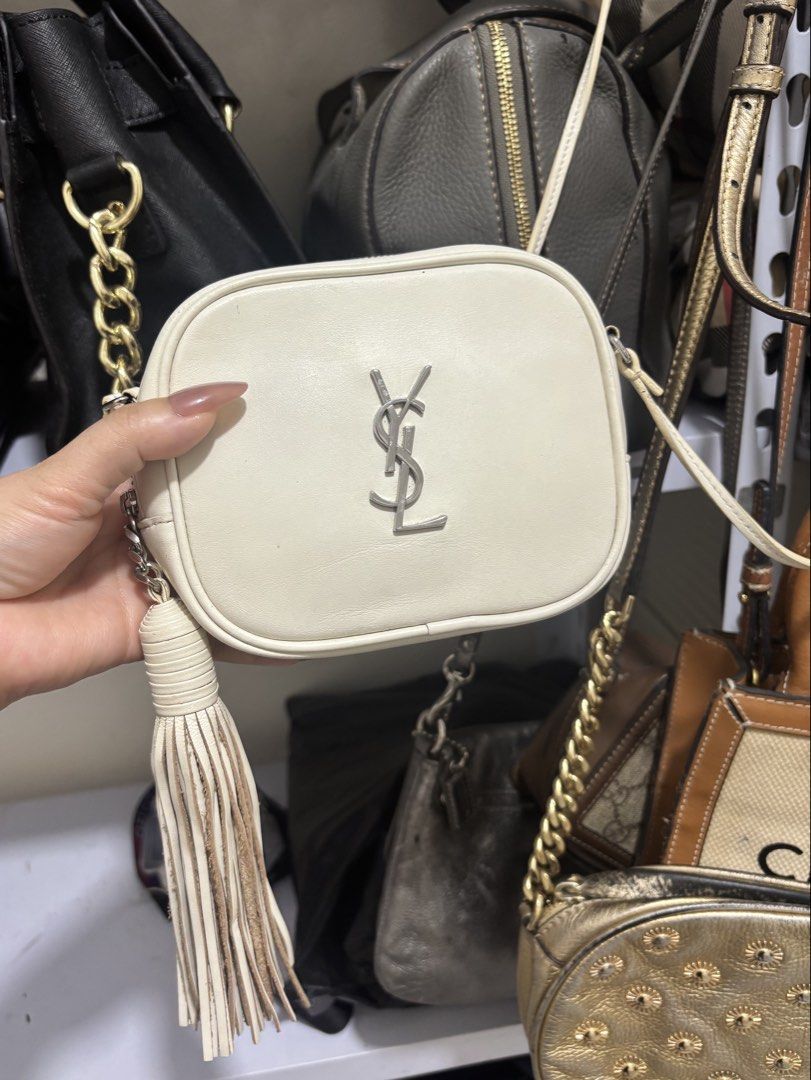 YSL sling bag (Category: Cross-body Bags) located in Angeles City. Submitted by ysa_main (Listing ID 1469143716, Image 1). Description: Pre owned bag from korea Ukay source not bnew Super shalla neto may minimal stain lang sa may taas bandang zipper.