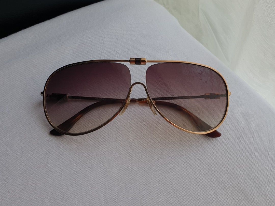 Yves Saint Laurent Aviator Sunglasses (Category: Sunglasses & Eyewear) located in Quezon City. Submitted by WasalakTwo (Listing ID 1468950848, Image 3). Description: Bought in Japan Made in Italy Authentic Goodcondition Clean and presentable Open for delivery nationwide.