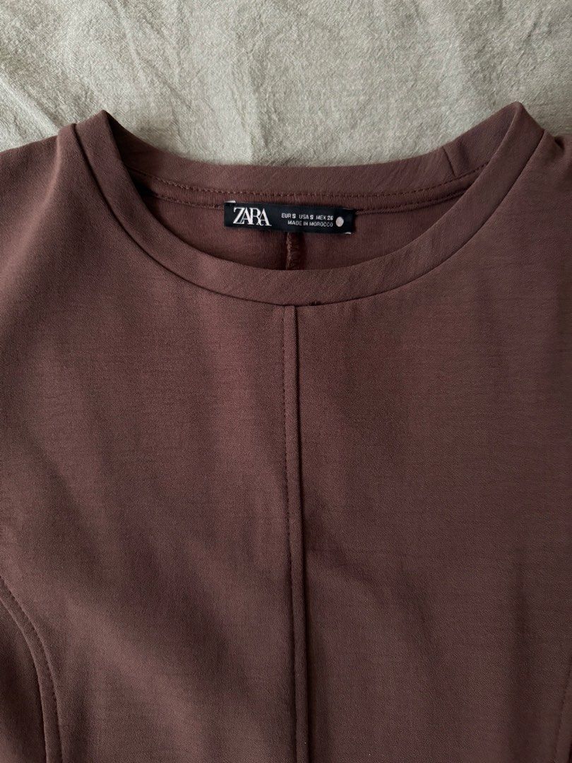 ZARA — Brown Dress (Category: Dresses) located in Manila. Submitted by tricia_lara (Listing ID 1468965648, Image 2). Description: It’s a skater type of dress! Very very flattering and the material is really high quality 💯 has a zipper also on the side :) wore this 3x times only but in super good condition! Shipping via grab/lalamove only 📍 Taft Manila.