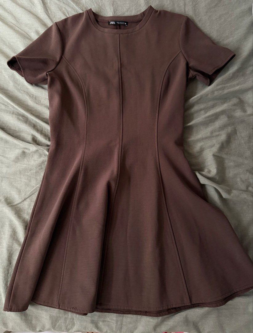 ZARA — Brown Dress (Category: Dresses) located in Manila. Submitted by tricia_lara (Listing ID 1468965648, Image 1). Description: It’s a skater type of dress! Very very flattering and the material is really high quality 💯 has a zipper also on the side :) wore this 3x times only but in super good condition! Shipping via grab/lalamove only 📍 Taft Manila.