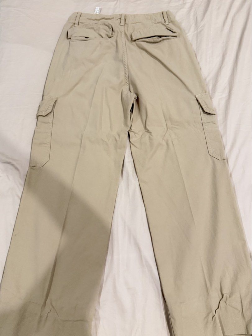 Zara beige cargo pants size EUR 34 (Category: Jeans) located in Manila. Submitted by pinkyclothes1267 (Listing ID 1469029327, Image 2). Description: - Brand: Zara - Style: Cargo pants with multiple front and back utility pockets - Color: Classic beige - Size: EUR 34 / USA 2 / MEX 24 - Material: 100% Cotton (Made in Bangladesh) - Closure: Button closure with zip fly and standard belt loops - Condition: Excellent, ready to wear.