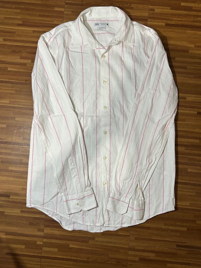 Zara Button Down Long Sleeve (Category: Formal Shirts) located in Cebu City. Submitted by m.arn127 (Listing ID 1469079126, Image 2). Description: rfs: not my style used only twice Dimensions: L: 28 inch W: 20.5 inch size M on tag SF to be shouldered by Buyer.