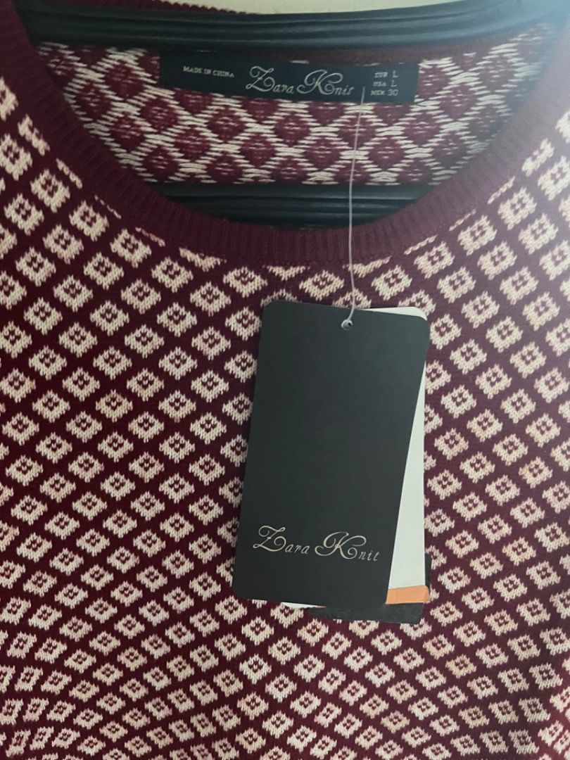 Zara Knit Top Geometric Pattern Maroon (Category: Blouses) located in Muntinlupa City. Submitted by closet_queen_13 (Listing ID 1469160157, Image 2). Description: - Brand: Zara - Style: Knit top with all-over geometric pattern - Color: Burgundy and white - Details: Crew neckline, short sleeves, standard fit - Fabric: Comfortable and stretchy - Condition: Brand new with original tags attached - Cotton, acrylic. Wool..