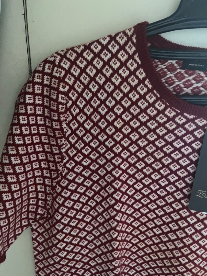 Zara Knit Top Geometric Pattern Maroon (Category: Blouses) located in Muntinlupa City. Submitted by closet_queen_13 (Listing ID 1469160157, Image 3). Description: - Brand: Zara - Style: Knit top with all-over geometric pattern - Color: Burgundy and white - Details: Crew neckline, short sleeves, standard fit - Fabric: Comfortable and stretchy - Condition: Brand new with original tags attached - Cotton, acrylic. Wool..