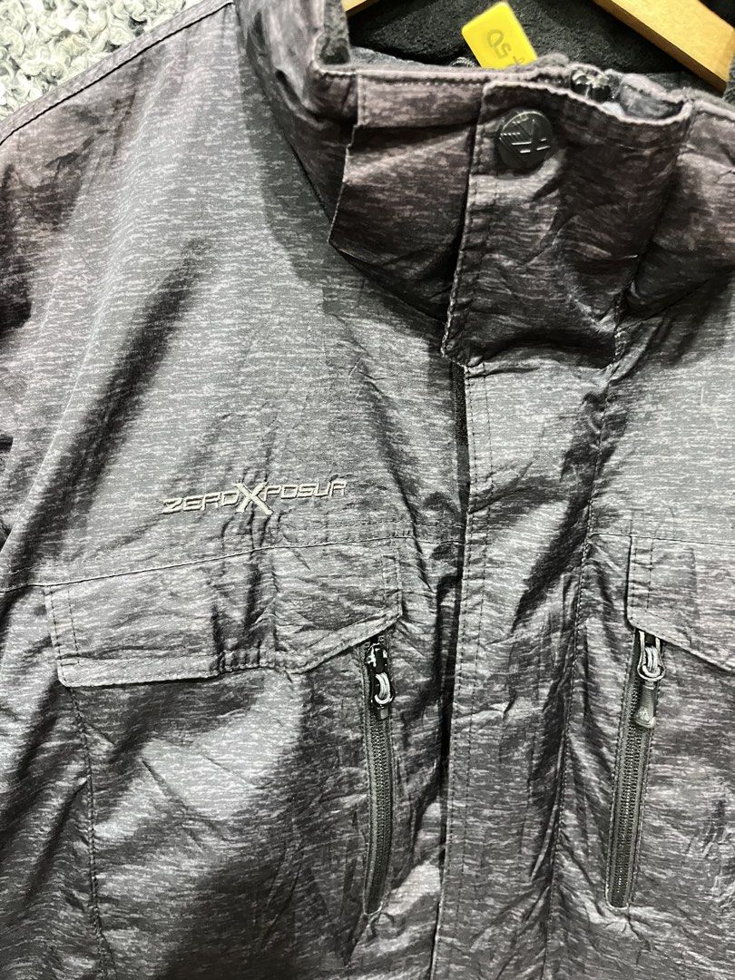 ZeroXposur Dozer Midweight Hooded Jacket | Size XL (Category: Coats, Jackets and Outerwear) located in General Trias. Submitted by zrchustle.604 (Listing ID 1469079300, Image 2). Description: ZeroXposur Dozer Midweight Hooded Jacket (with the hood missing or detached in this photo) in a charcoal heather grey finish..