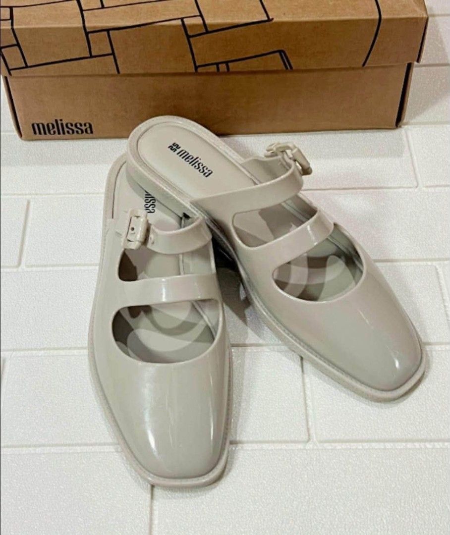 100% ORIGINAL MELISSA (Category: Flats & Sandals) located in Manila. Submitted by mydytrends (Listing ID 1465428613, Image 2). Description: NEHO PRICE FOR SURE MINER - 100% Original Melissa Anastacia sandals - Color: Elegant neutral cream/beige - Available Sizes: 7, 8, 10 - Features a chic square toe and trendy double-strap buckle design - Made of signature comfortable and durable Melissa jelly material - Complete with original box.