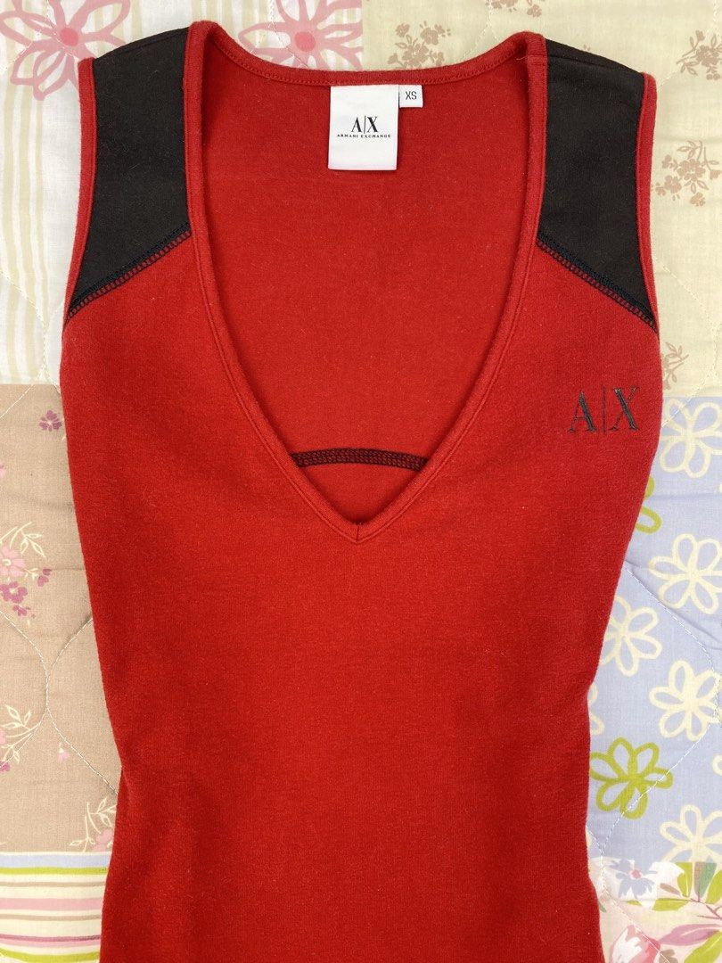 2000’s Armani Exchange Vneck Tank Top (Category: Sleeveless) located in Angeles City. Submitted by fruits.ph (Listing ID 1465437994, Image 3). Description: Measurements B:14” W:13” L:19” Size on Tag: XS Best Fit: S-M *Flat lay measurements* Mannequin Size: M (34”; 25”) Color Rate: 10/10 Flaws: None Fabric Type: Cotton Spandex/ Stretchable Fabric ***Color may vary due to lighting. This item is properly washed and disinfected.***.