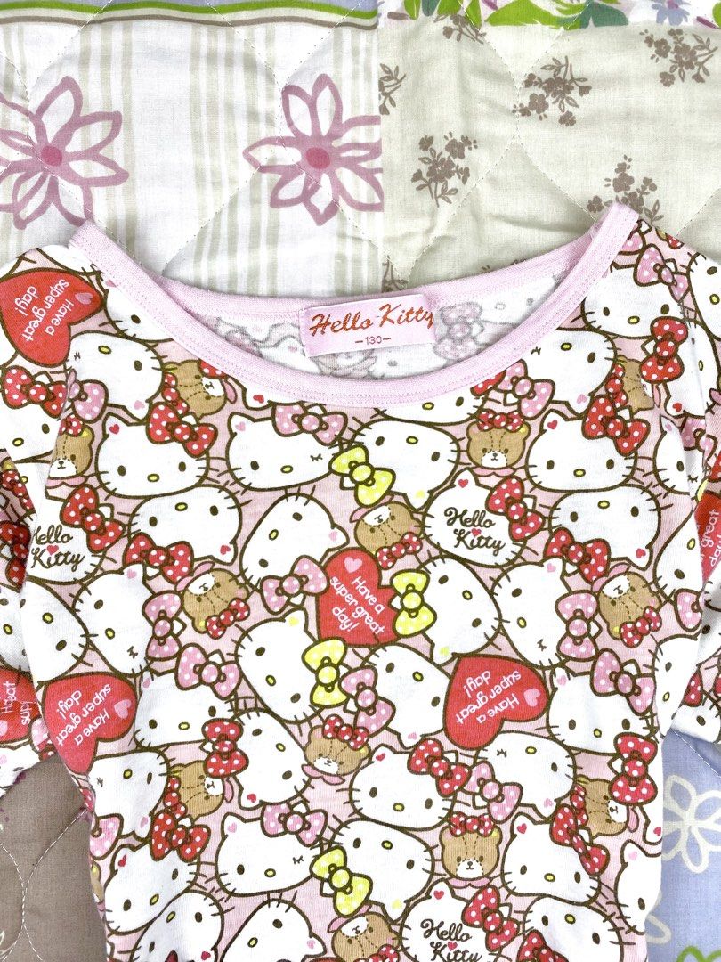 2000’s Hello Kitty All Over Print Baby Tee (Category: Shirts) located in Angeles City. Submitted by fruits.ph (Listing ID 1465423472, Image 3). Description: Measurements B:14” W:14” L:18” Size on Tag: ❌ Best Fit: S-M *Flat lay measurements* Mannequin Size: M (34”; 25”) Color Rate: 10/10 Flaws: None Fabric Type: Cotton/ Stretchable Fabric ***Color may vary due to lighting. This item is properly washed and disinfected.***.
