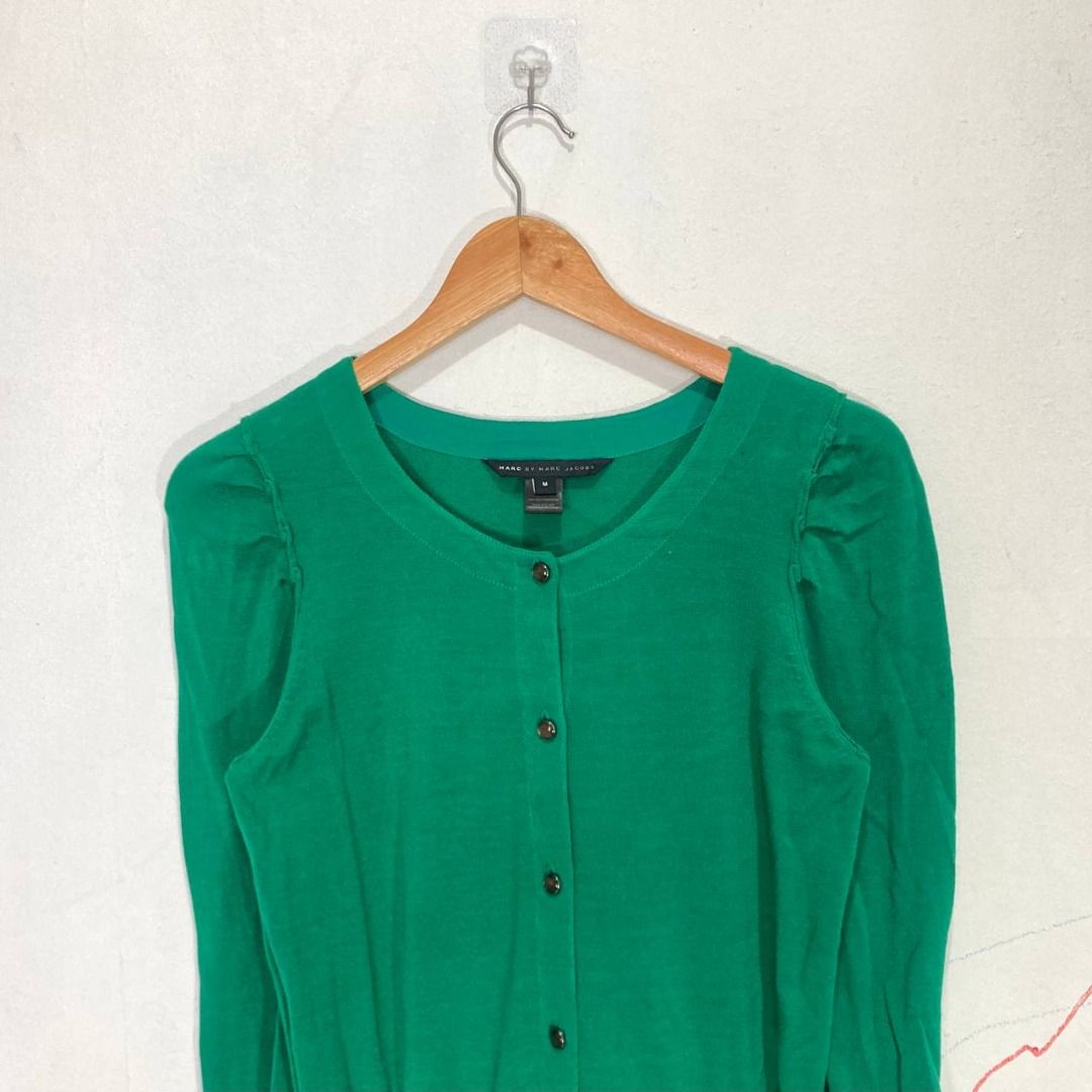 2010 Marc By Marc Jacobs Cardigan (Category: Coats, Jackets and Outerwear) located in Quezon City. Submitted by stylenpick (Listing ID 1465467759, Image 3). Description: Brand: Marc By Marc Jacobs Made in: China Year: 2010 Material: Cotton Color: Kelly Green Marked size: M Sizing: Measurements (laid flat): Shoulders: 13.5" Sleeves: 25” Bust: 17” Waist: 15" Length: 25” Color rating: 8.5/10 Condition overall: 8/10 Flaws: missing one button jewel, c
