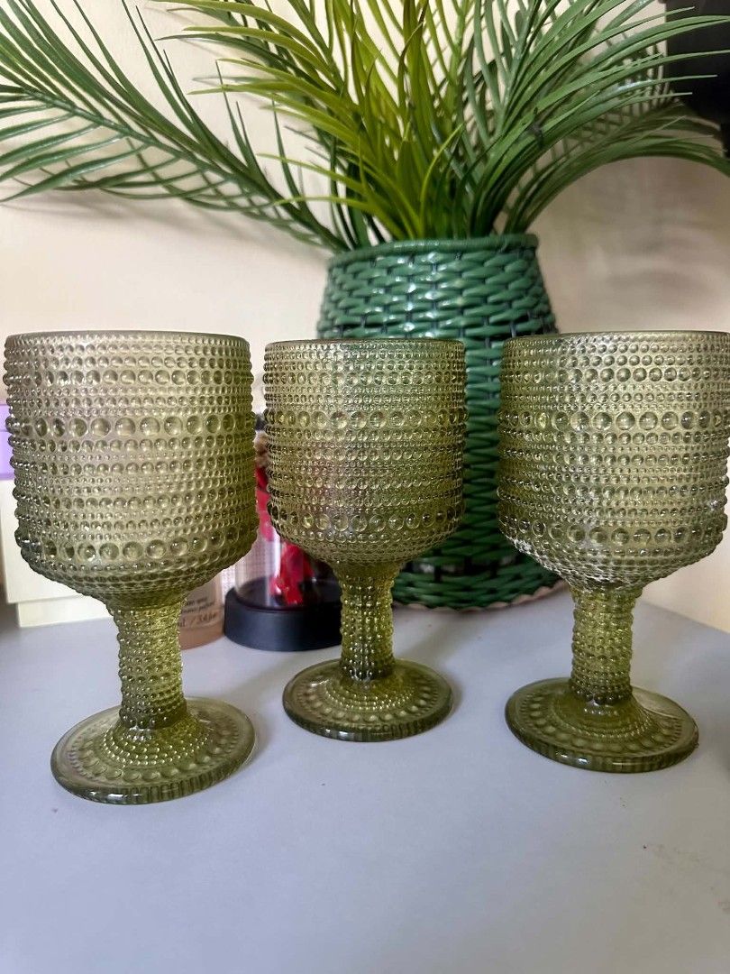 25 pcs Green Hobnail Glass Goblets (Category: Dinnerware & Cutlery) located in Manila. Submitted by kbedeclutters (Listing ID 1465391378, Image 3). Description: - 25 pcs vintage-style green glass goblets - Features textured hobnail dots for a comfortable and secure grip - Sturdy stemmed design with wide bases for stability - Ideal for water, wine, or cocktails at dinner parties - Excellent, clean condition with no chips or cracks - Selling as a s