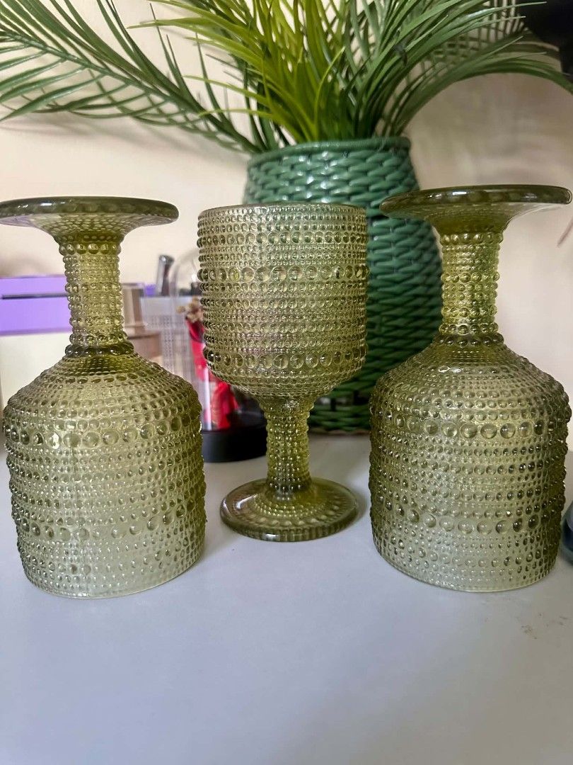 25 pcs Green Hobnail Glass Goblets (Category: Dinnerware & Cutlery) located in Manila. Submitted by kbedeclutters (Listing ID 1465391378, Image 2). Description: - 25 pcs vintage-style green glass goblets - Features textured hobnail dots for a comfortable and secure grip - Sturdy stemmed design with wide bases for stability - Ideal for water, wine, or cocktails at dinner parties - Excellent, clean condition with no chips or cracks - Selling as a s