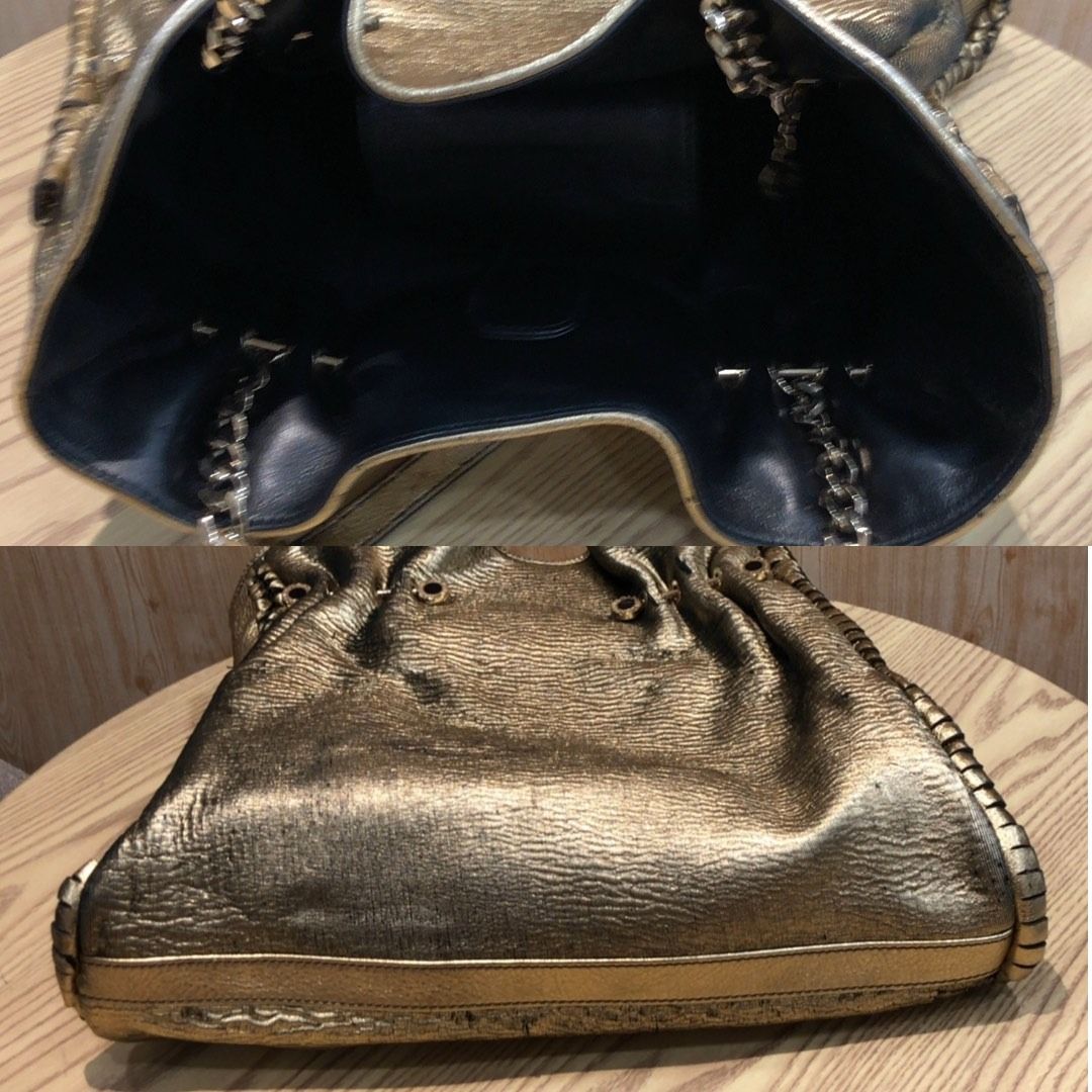 267009679 BVLGARI BAG METALLIC (Category: Luxury Bags & Wallets) located in Taguig. Submitted by ecoring.ph (Listing ID 1465403254, Image 3). Description: ◆CONDITION: BC ◆DESCRIPTIONS: (Other defects/info:) OUTER: The ribbed sheet fabric body of the bag is scratched, scuffed, stained, dirty, faded, wrinkled, and stiffened in parts, has a peeled coating and press marks, and shows signs of use. The knotted leather lining and gussets of the bag are 