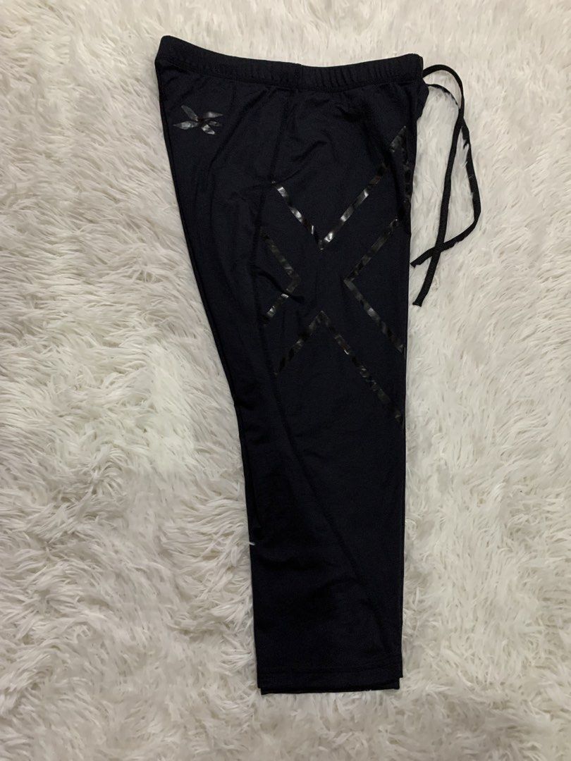 2XU Men's Compression Tights Pants Black Size M (Category: Activewear) located in Iba. Submitted by thriftcoyan (Listing ID 1465495925, Image 3). Description: - Brand: 2XU - Item: Men's Compression Tights - Size: Medium - Color: Solid Black - Fit: Secure drawstring waistband - Branding: Iconic X logo on front leg and waistband - Origin: Designed in Australia, Made in Thailand - Ideal for: Running, gym workouts, and high-performance training.
