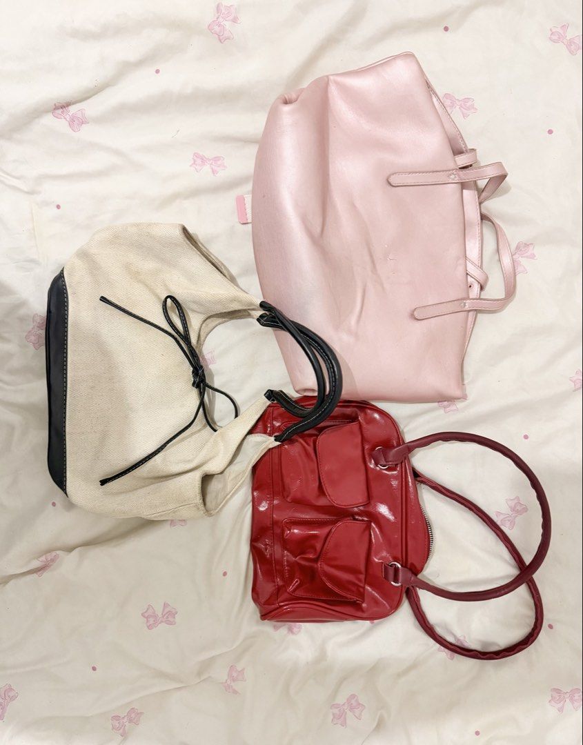 3 BAGS TAKE ALL !! (Category: Shoulder Bags) located in Quezon City. Submitted by catmumcertiflied (Listing ID 1465484913, Image 1). Description: - Brand/Model: Mikana Tote Bag - Color/Material: Metallic pink faux leather - Design: Soft slouchy shape with double shoulder straps and minimalist front branding - Interior: Spacious, perfect for everyday carry - Condition: Good, with some light creasing from storage Mikana Pink Bag 👛✨ Red Handbag (ve