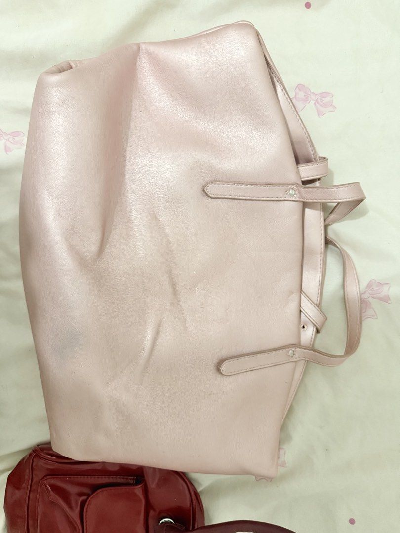 3 BAGS TAKE ALL !! (Category: Shoulder Bags) located in Quezon City. Submitted by catmumcertiflied (Listing ID 1465484913, Image 2). Description: - Brand/Model: Mikana Tote Bag - Color/Material: Metallic pink faux leather - Design: Soft slouchy shape with double shoulder straps and minimalist front branding - Interior: Spacious, perfect for everyday carry - Condition: Good, with some light creasing from storage Mikana Pink Bag 👛✨ Red Handbag (ve